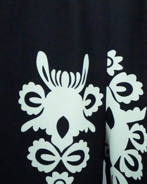 White floral patterns on a black background