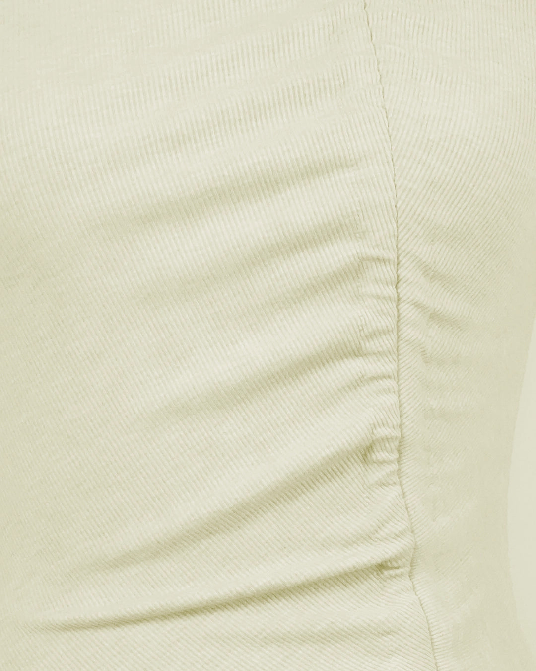 Close-up of a light beige fabric texture
