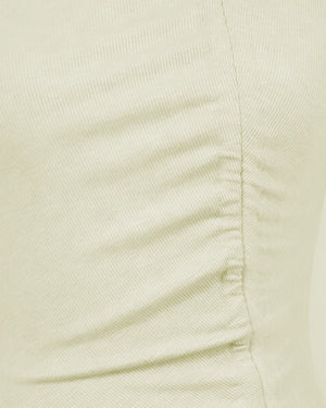 Close-up of a light beige fabric texture