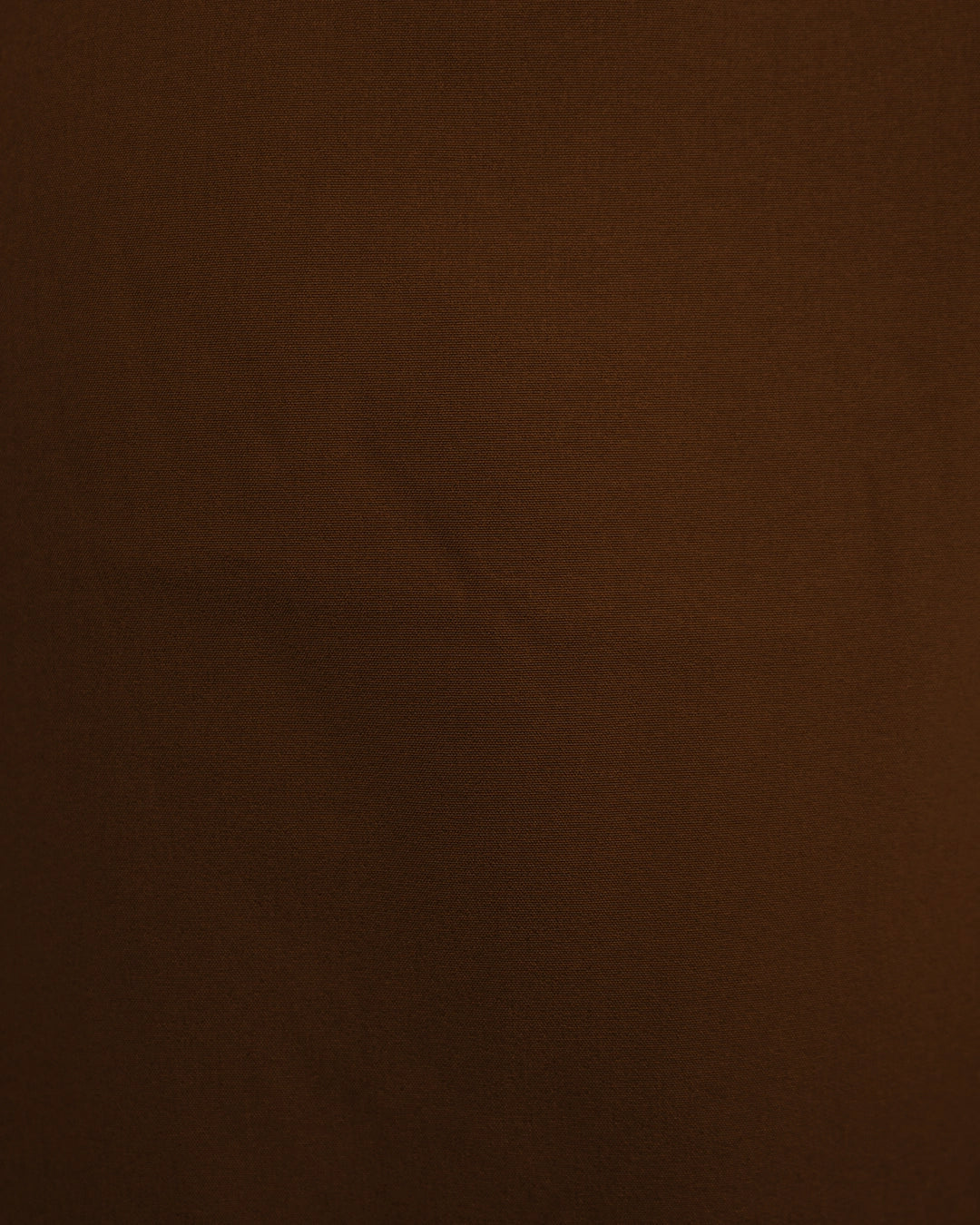 BeboNLolo rust  wrap dress close-up showing V-neckline and ruffle fabric detail – Close-Up View