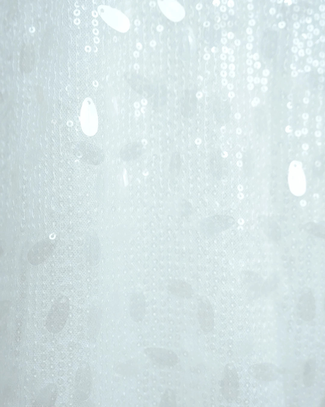BeboNLolo Radiant Sequin Embellished Dress close-up showing white sequins and fine texture – Close-Up View