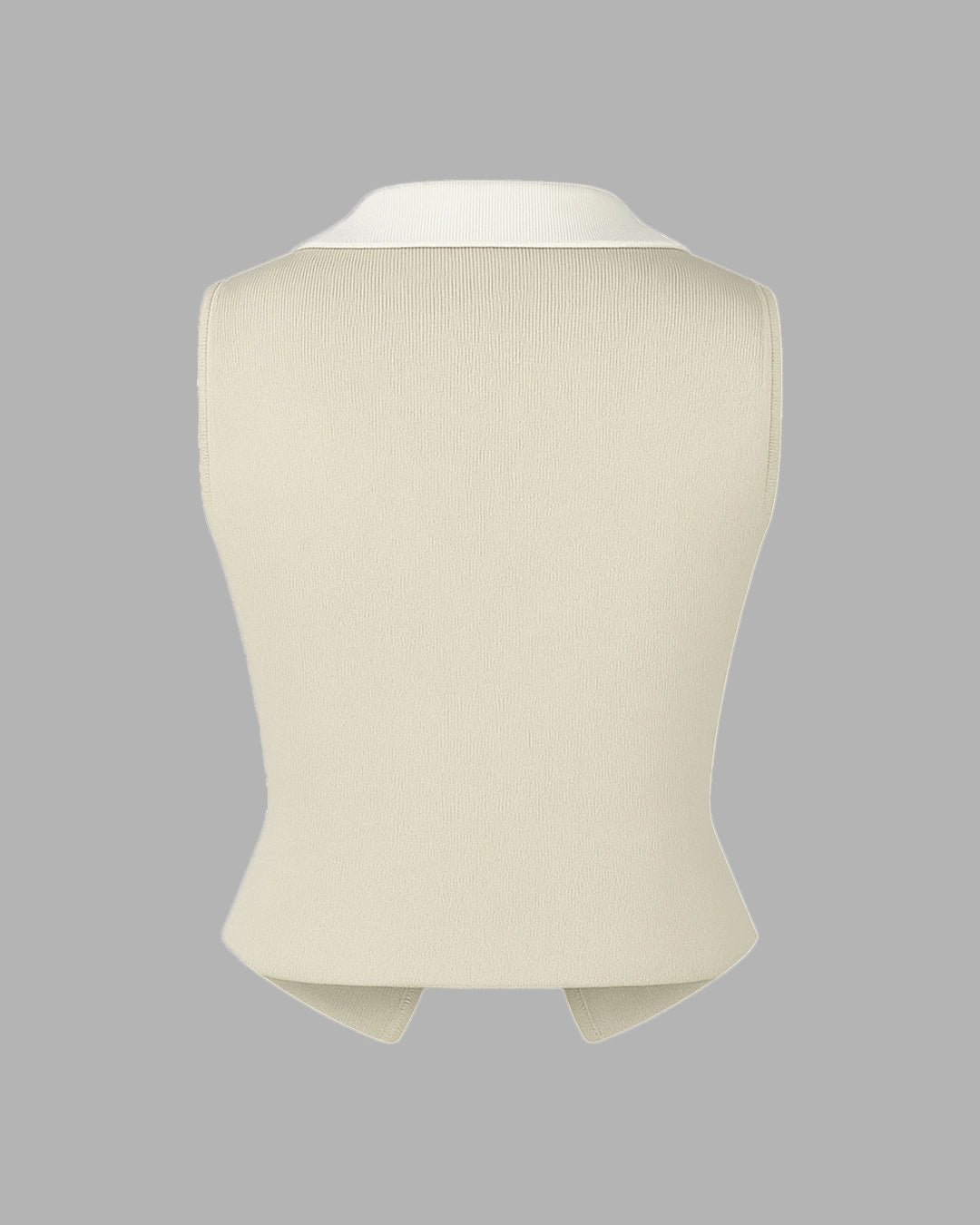 Beige knitted vest on a gray background