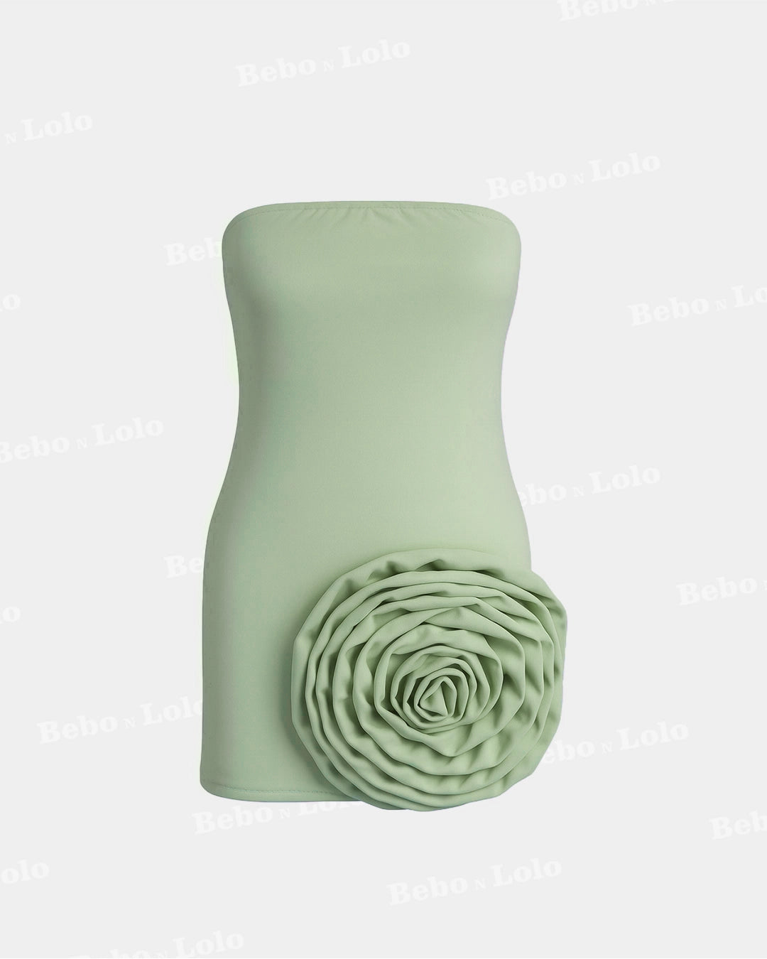 Green strapless top with a floral detail on a light gray background
