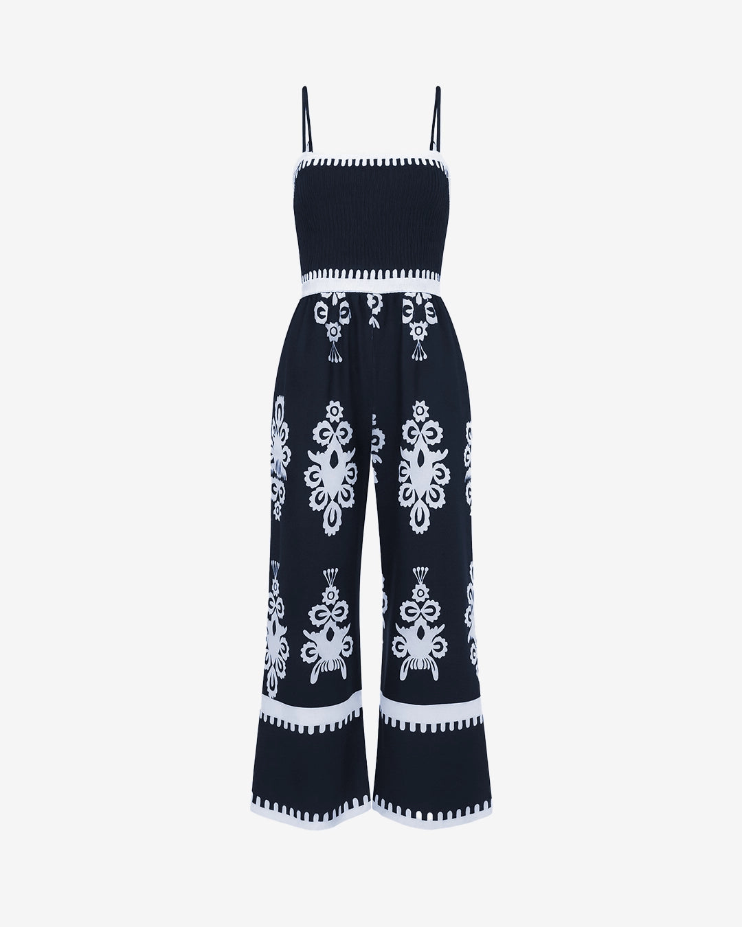 Navy blue jumpsuit with white embroidery on a white background