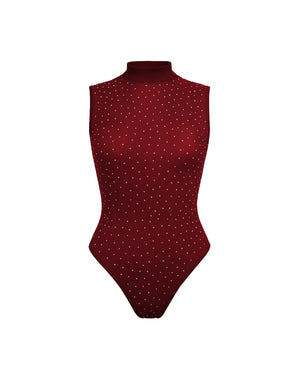 Red polka dot swimsuit on a white background