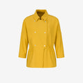 Yellow raincoat on a light gray background