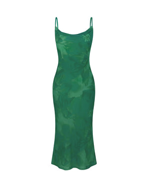 Green slip dress on a white background