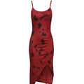 Red dress with black floral patterns on a white background