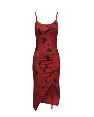 Red dress with black floral patterns on a white background