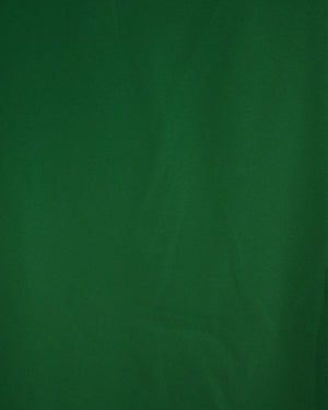 BeboNLolo Ruffle Charm Button Top in green close-up showing button details and ruffle sleeve trim – Close-Up View