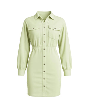 Light green dress with button details on a white background