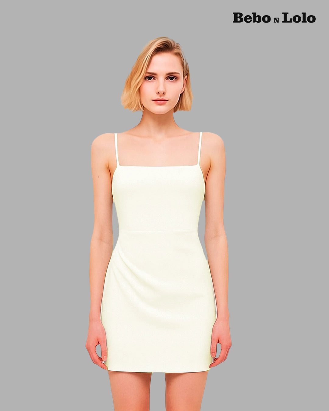 Woman wearing a white dress against a gray background with 'Bebó n Lolo' branding.