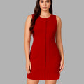 Woman wearing a red dress against a gray background