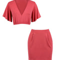 Red crop top and skirt set on a white background