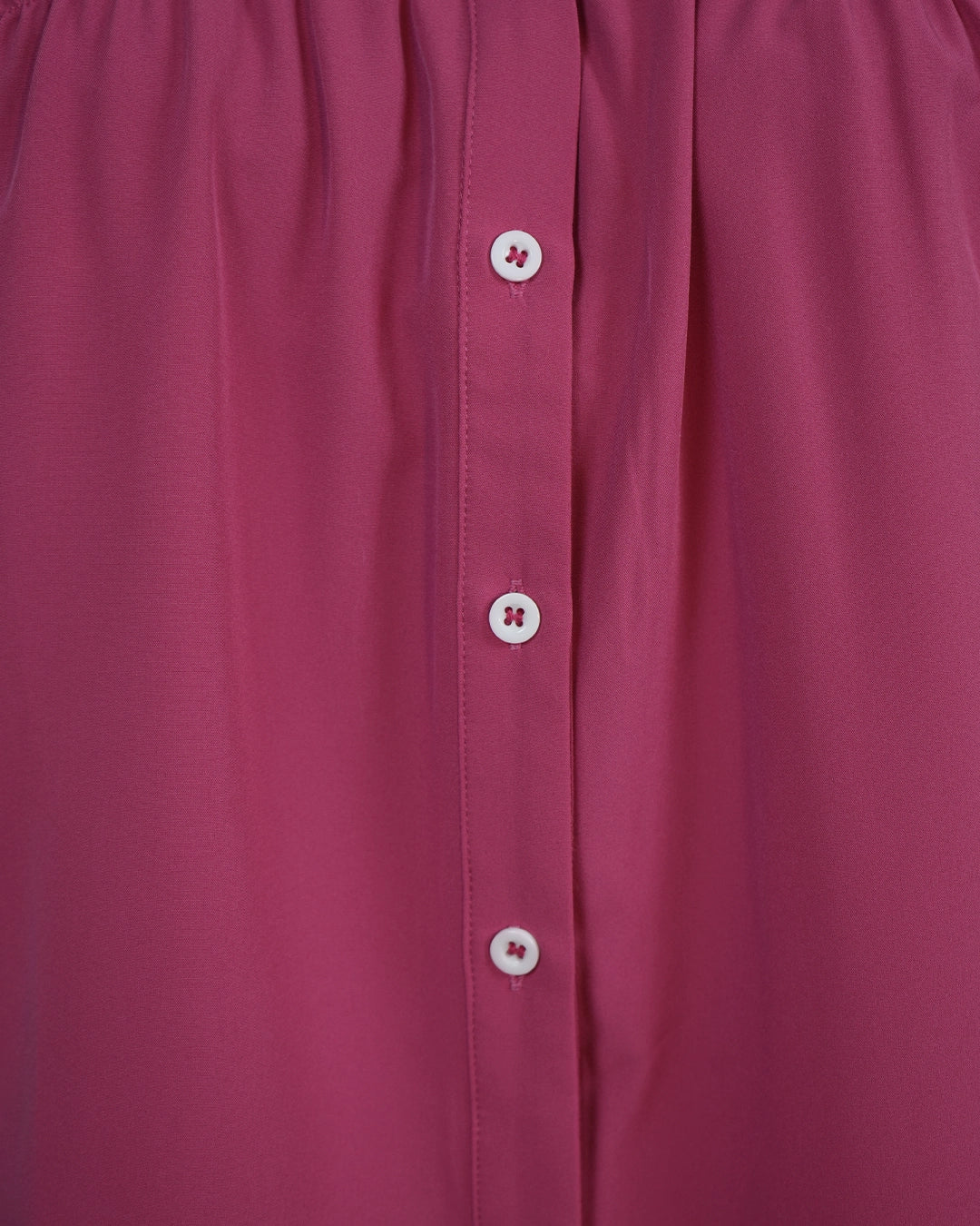 BeboNLolo Ruffle Charm Button Top in pink close-up showing button details and ruffle sleeve trim – Close-Up View