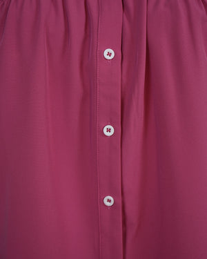BeboNLolo Ruffle Charm Button Top in pink close-up showing button details and ruffle sleeve trim – Close-Up View