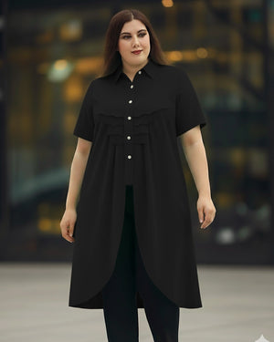 Woman wearing a black dress with a blurred background