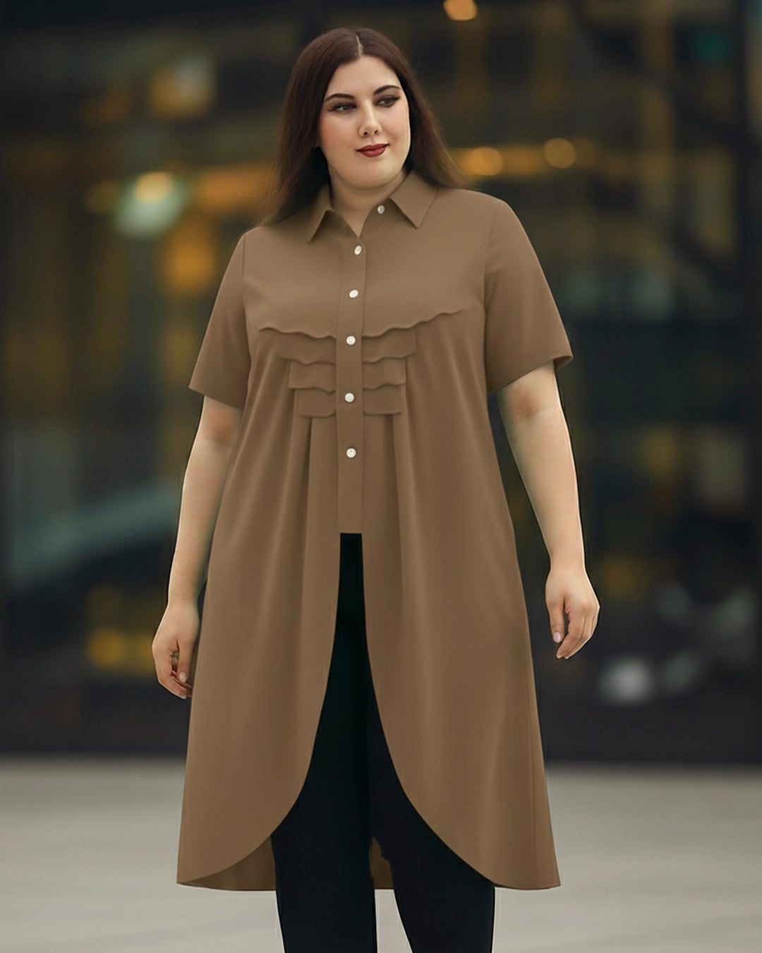 Woman wearing a long brown shirt with a blurred background