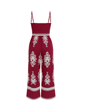 Red jumpsuit with white patterns on a white background
