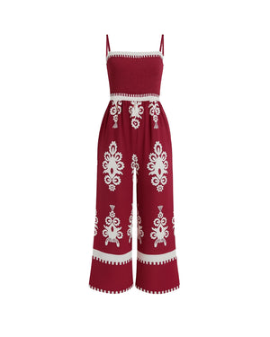 Red dress with white patterns on a white background
