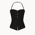 Black strapless top with button details on a white background