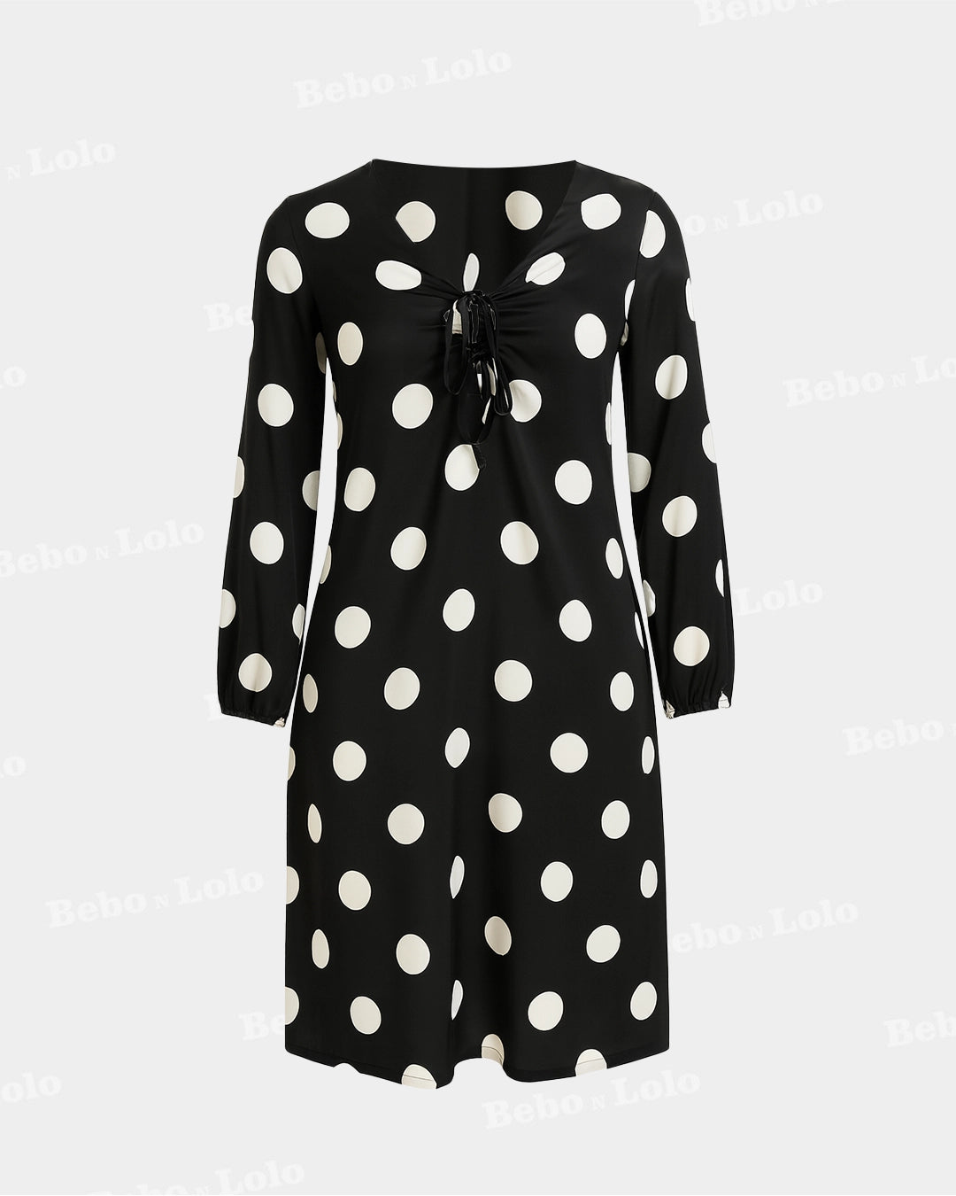 BeboNLolo black polka dot dress with relaxed fit and classic dot pattern – Front  View
