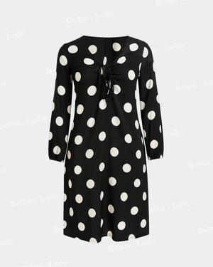 BeboNLolo black polka dot dress with relaxed fit and classic dot pattern – Front  View